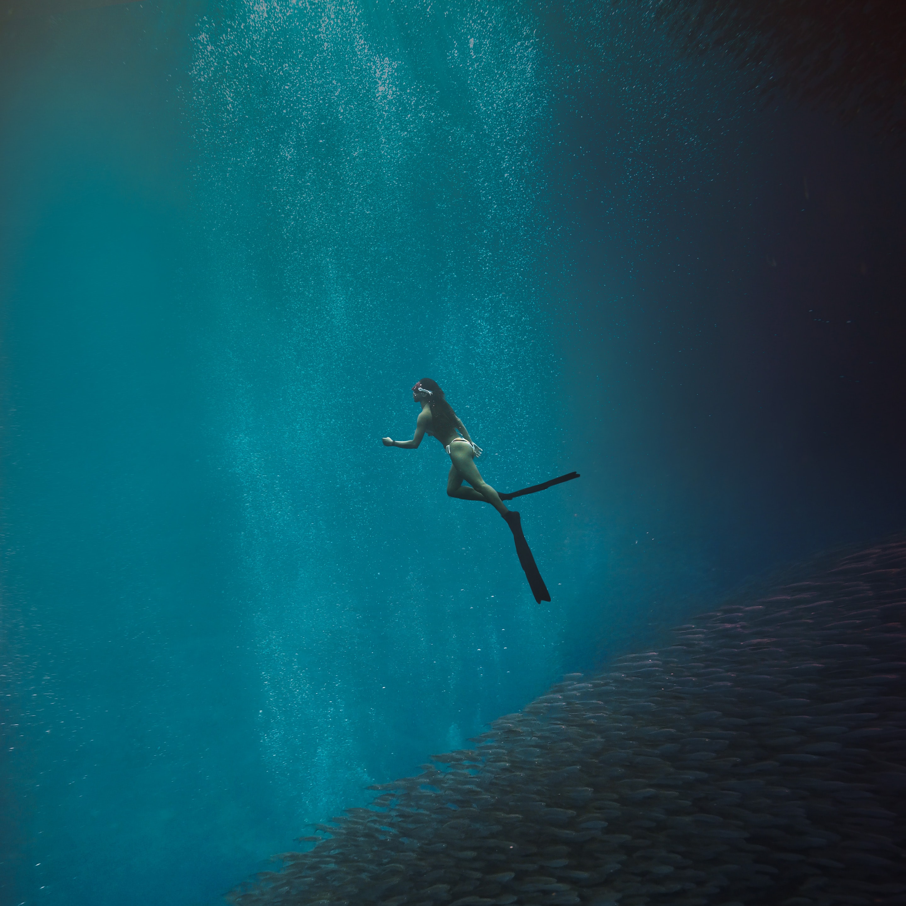 A woman deep-sea diving