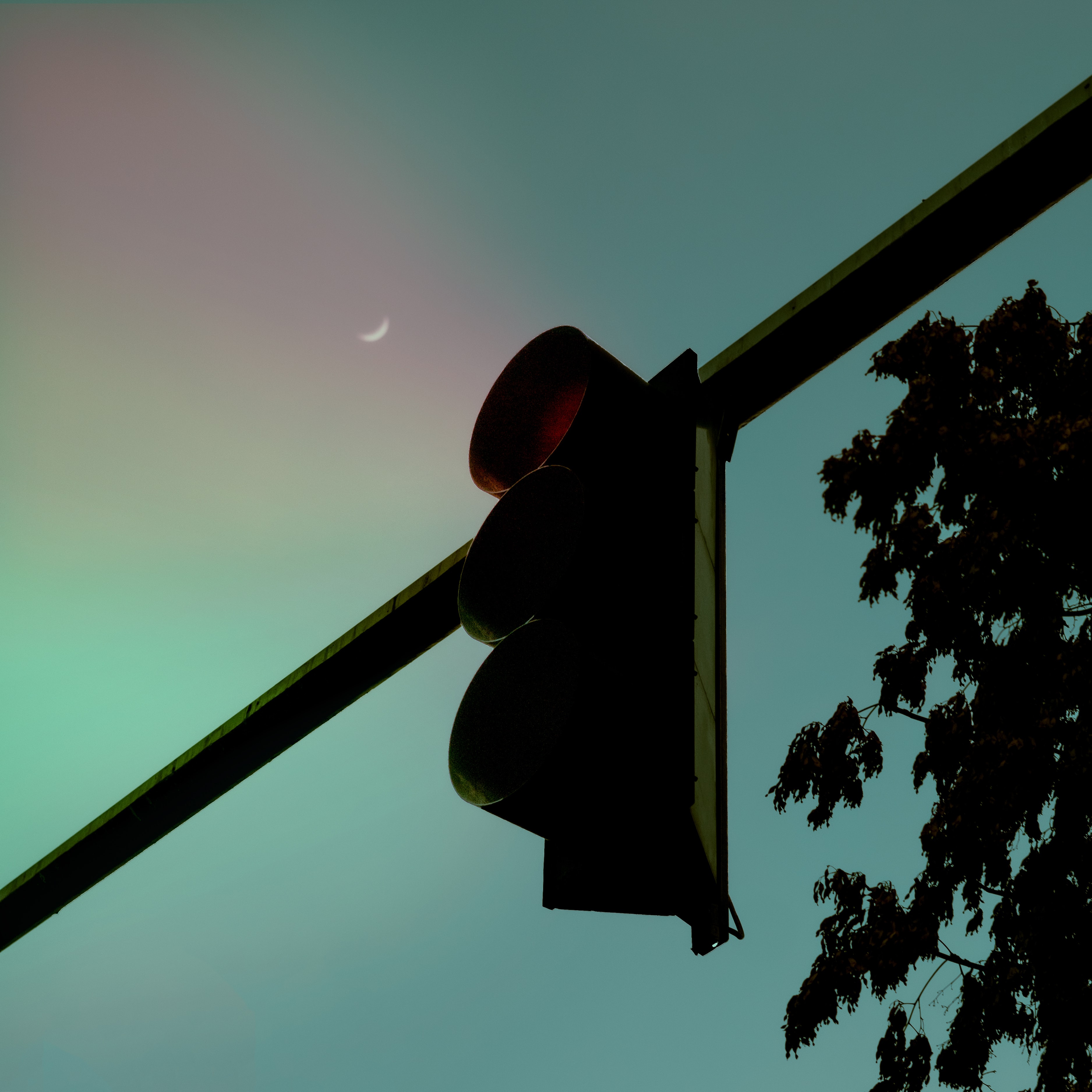 A traffic light at night